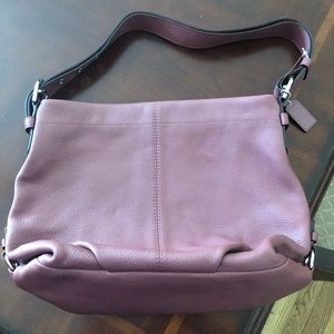 Mauve colored Coach purse